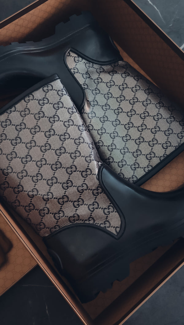 Gucci monogram print boots