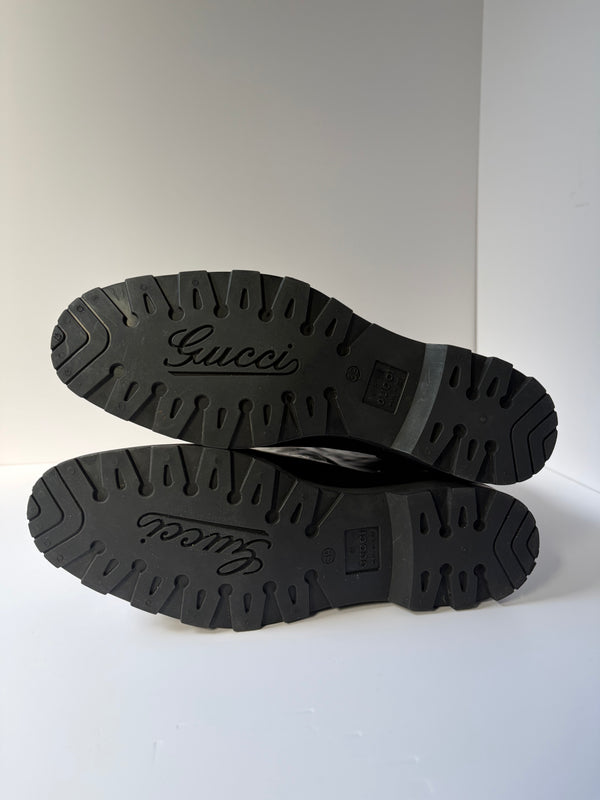 Gucci monogram print boots