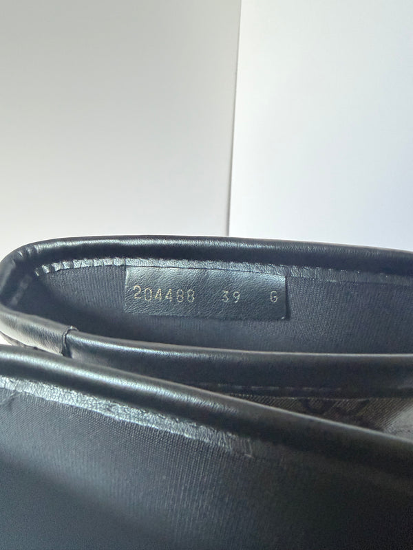 Gucci monogram print boots