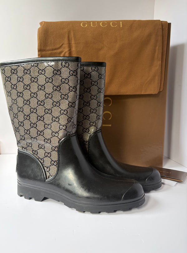 Gucci monogram print boots